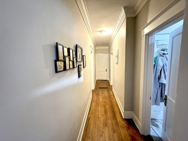 260 N Willett St, Memphis, TN 38112 - hallway featuring dark wood-style flooring, crown molding, and baseboards
