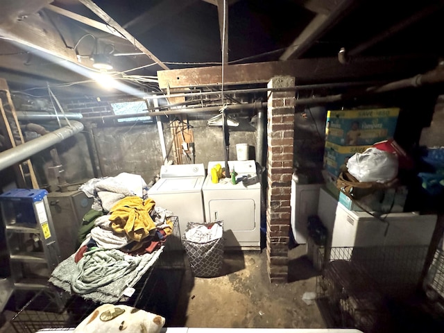 260 N Willett St, Memphis, TN 38112 - unfinished basement featuring independent washer and dryer