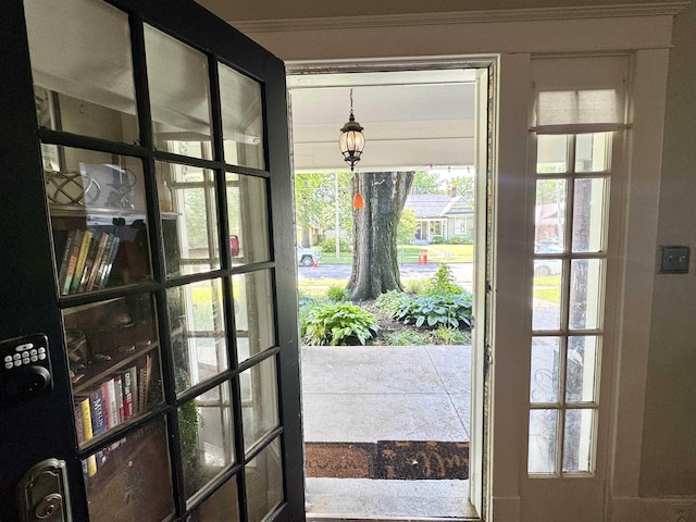 260 N Willett St, Memphis, TN 38112 - doorway featuring plenty of natural light and crown molding