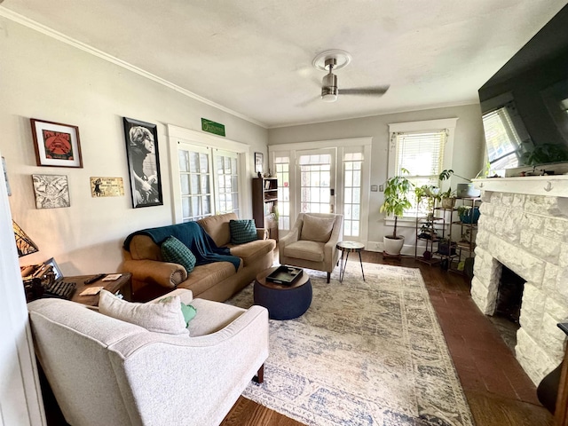 260 N Willett St, Memphis, TN 38112 - living area with a ceiling fan, ornamental molding, a fireplace, dark wood-type flooring, and baseboards