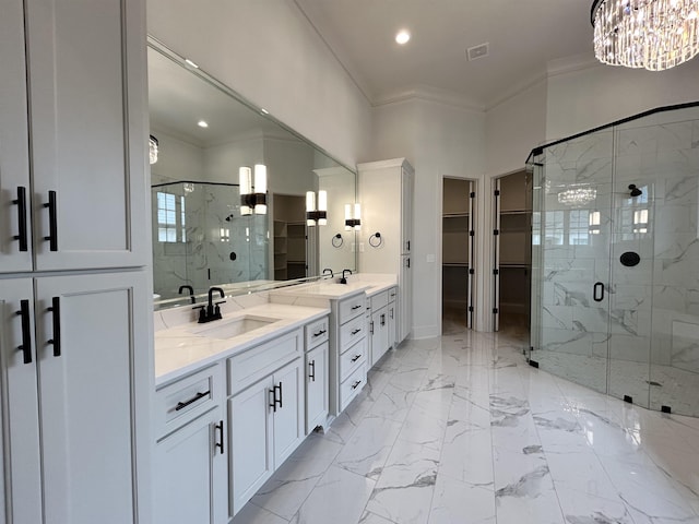 602 Cedar Shadows Cir W, Collierville, TN 38017 - full bathroom with crown molding, a marble finish shower, a walk in closet, double vanity, and recessed lighting