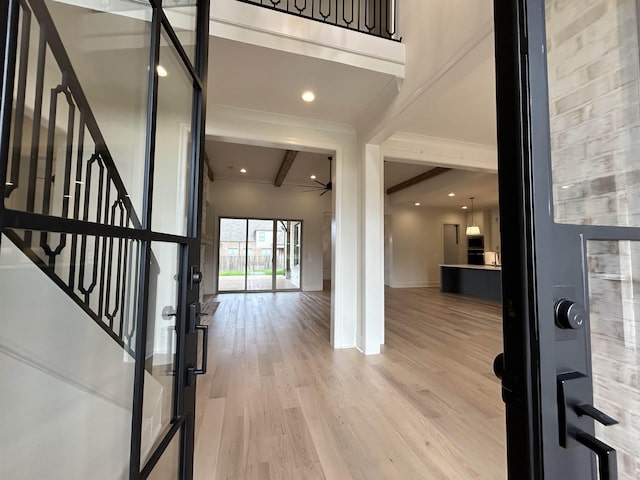 602 Cedar Shadows Cir W, Collierville, TN 38017 - entryway with light wood-type flooring, baseboards, and stairway