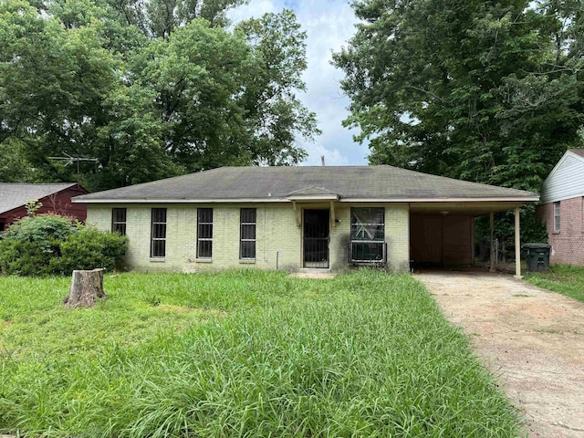 3701 Dorado Cv, Memphis, TN 38128 - view of front of property with driveway, a carport, brick siding, and roof with shingles
