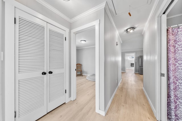 45 Daniel St, Savannah, TN 38372 - hall with light wood-style flooring, attic access, ornamental molding, and baseboards