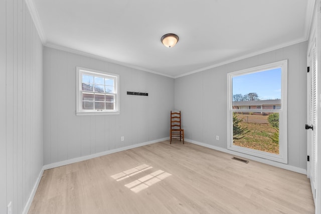 45 Daniel St, Savannah, TN 38372 - empty room featuring crown molding, wood finished floors, and baseboards