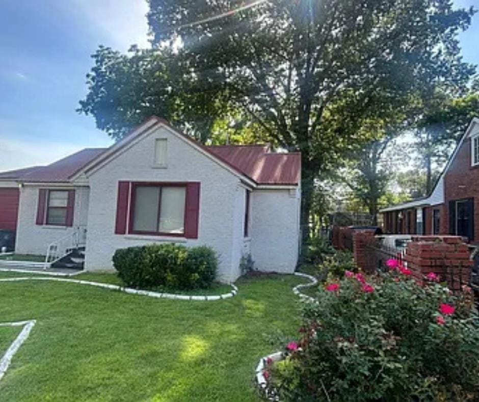 931 Maxey St, Memphis, TN 38111 - view of property exterior featuring a yard