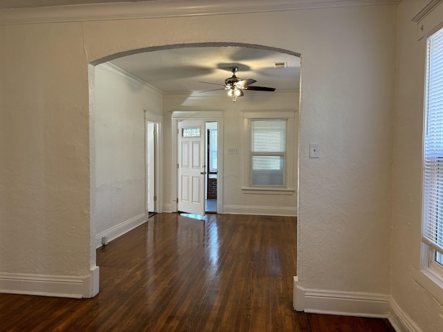 1593 Waverly Ave, Memphis, TN 38106 - foyer entrance with hardwood / wood-style flooring, a ceiling fan, arched walkways, baseboards, and ornamental molding
