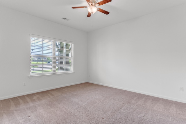 45 Laurel Hedge Cv, Oakland, TN 38060 - spare room featuring carpet flooring, ceiling fan, and baseboards