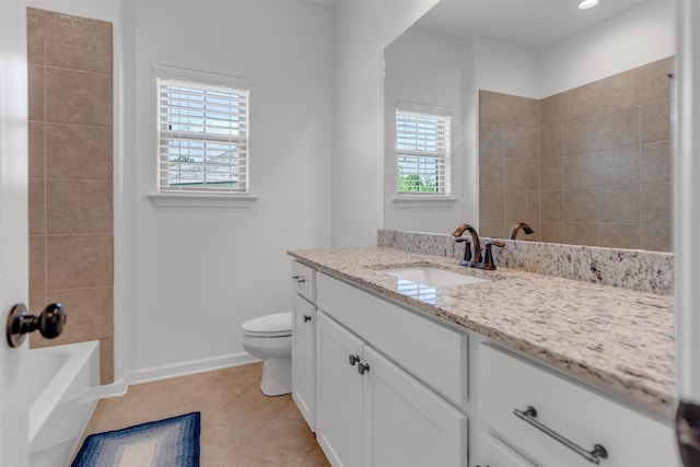 45 Laurel Hedge Cv, Oakland, TN 38060 - full bath with vanity, toilet, tile patterned floors, baseboards, and tub / shower combination