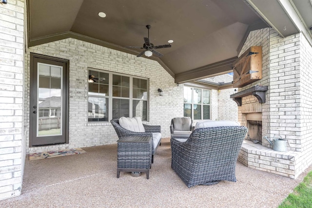 45 Laurel Hedge Cv, Oakland, TN 38060 - view of patio / terrace with a ceiling fan and an outdoor living space with a fireplace