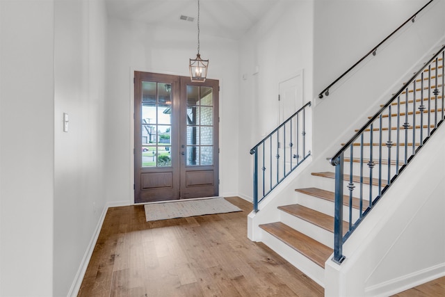 45 Laurel Hedge Cv, Oakland, TN 38060 - entryway featuring wood finished floors, baseboards, and stairway