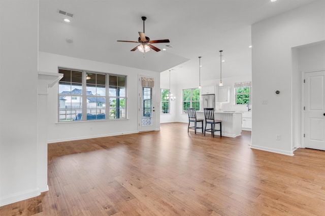 45 Laurel Hedge Cv, Oakland, TN 38060 - living room featuring a ceiling fan, light wood-style flooring, baseboards, a chandelier, and recessed lighting