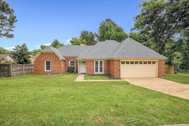 4386 S Germantown Rd, Memphis, TN 38125 - view of front of home featuring a garage, driveway, brick siding, roof with shingles, and a chimney