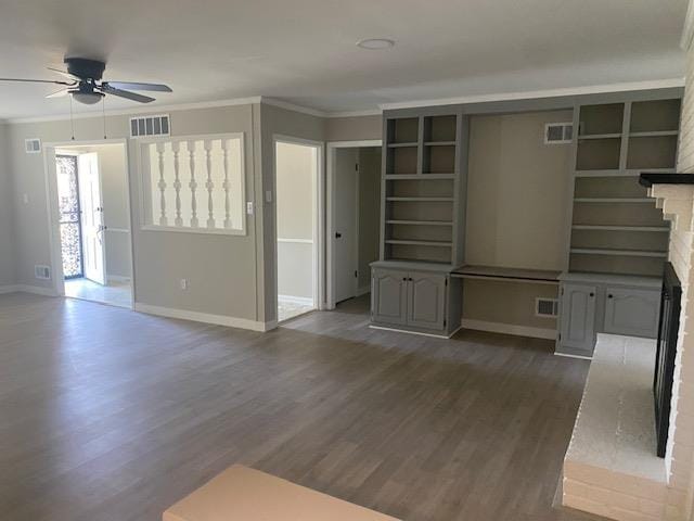 4947 Demeter Cv, Memphis, TN 38118 - unfurnished living room with a ceiling fan, ornamental molding, wood finished floors, and baseboards