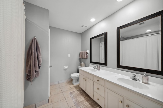 142 Granehampton Ln, Memphis, TN 38111 - full bath with double vanity, tile patterned floors, toilet, recessed lighting, and baseboards