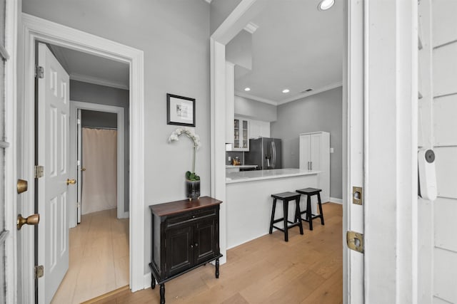 142 Granehampton Ln, Memphis, TN 38111 - hallway featuring ornamental molding, light wood-style floors, recessed lighting, and baseboards