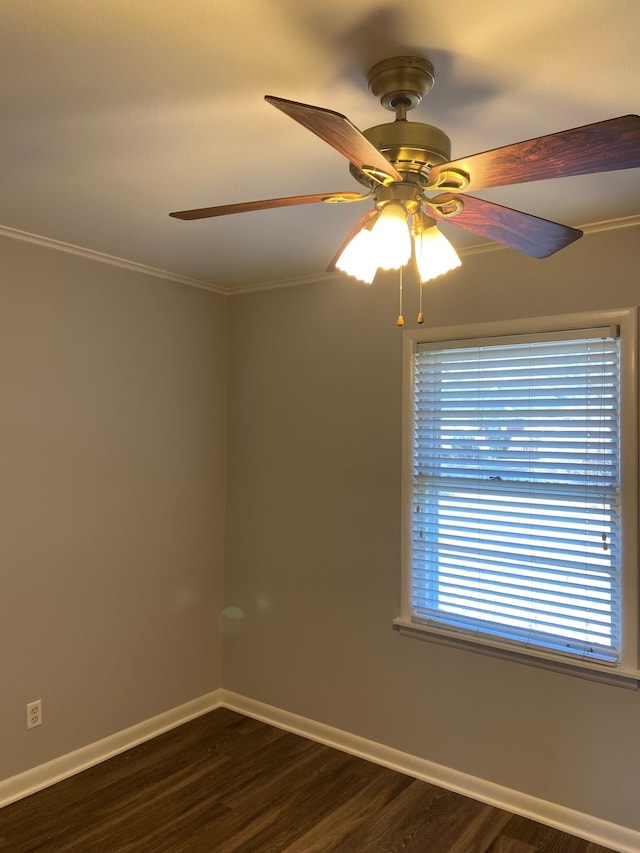 1770 Dorrie Ln, Memphis, TN 38117 - empty room featuring dark wood-style flooring, ceiling fan, baseboards, and ornamental molding