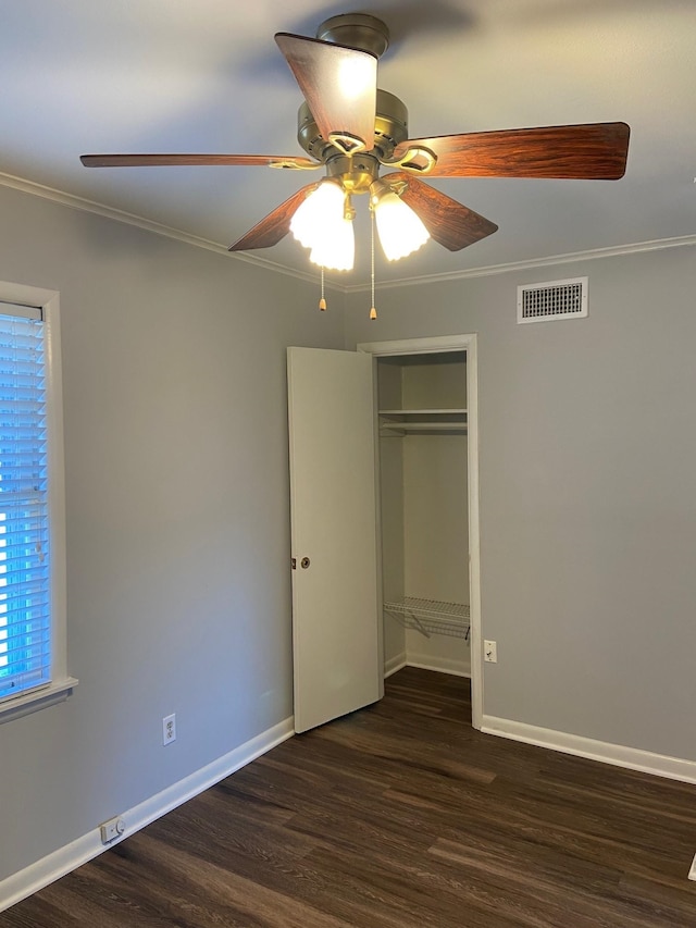 1770 Dorrie Ln, Memphis, TN 38117 - unfurnished bedroom featuring ornamental molding, wood finished floors, baseboards, and ceiling fan