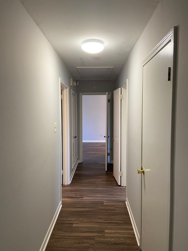 1770 Dorrie Ln, Memphis, TN 38117 - hall featuring attic access, dark wood finished floors, and baseboards