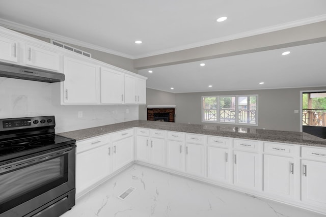 229 Coats Rd, Brighton, TN 38011 - kitchen with range with electric cooktop, under cabinet range hood, stone counters, recessed lighting, and white cabinetry