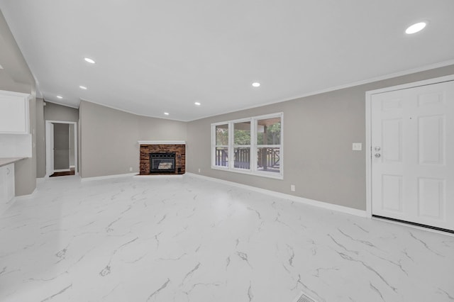 229 Coats Rd, Brighton, TN 38011 - unfurnished living room with recessed lighting, baseboards, light marble finish flooring, a glass covered fireplace, and crown molding