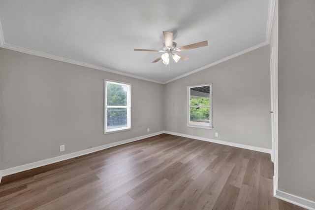 229 Coats Rd, Brighton, TN 38011 - spare room with plenty of natural light, ceiling fan, wood finished floors, vaulted ceiling, and baseboards