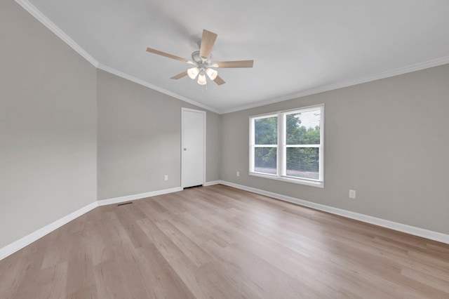 229 Coats Rd, Brighton, TN 38011 - unfurnished room with lofted ceiling, light wood finished floors, a ceiling fan, baseboards, and crown molding