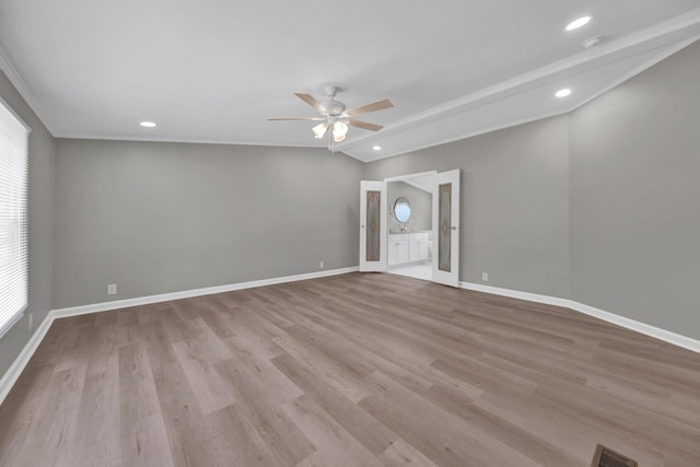229 Coats Rd, Brighton, TN 38011 - spare room with a ceiling fan, light wood-style floors, recessed lighting, baseboards, and crown molding