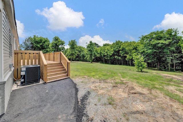 229 Coats Rd, Brighton, TN 38011 - view of grassy yard with central AC unit and stairway