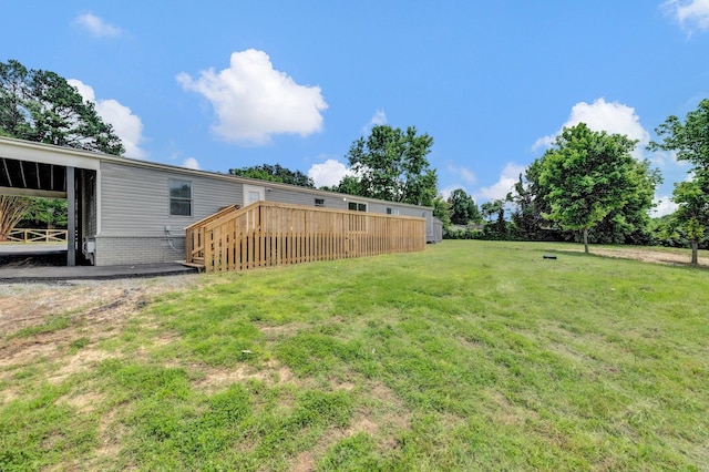 229 Coats Rd, Brighton, TN 38011 - view of grassy yard featuring a wooden deck