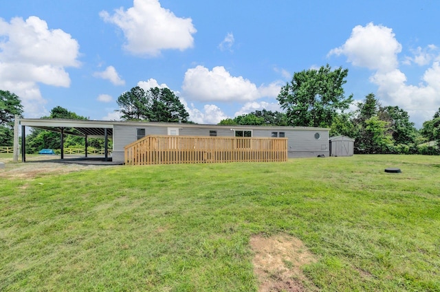 229 Coats Rd, Brighton, TN 38011 - view of grassy yard featuring a deck and an attached carport