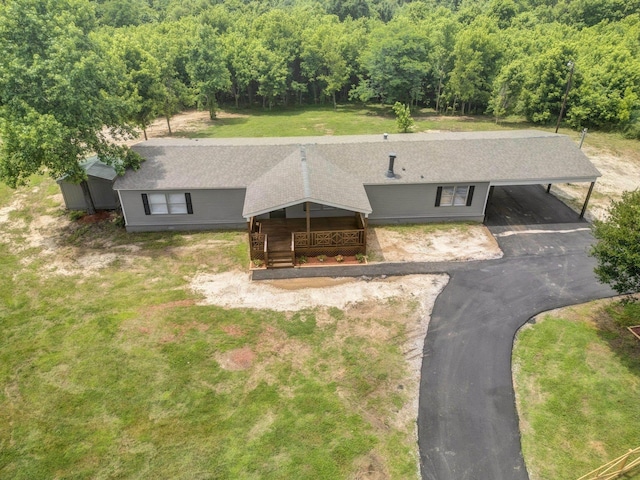 229 Coats Rd, Brighton, TN 38011 - aerial view of property and surrounding area featuring a heavily wooded area