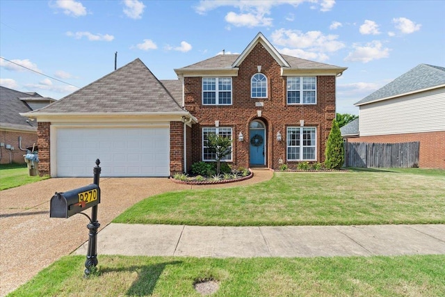 9270 Durhamshire Dr, Cordova, TN 38016 - view of front of house with concrete driveway, a garage, and brick siding