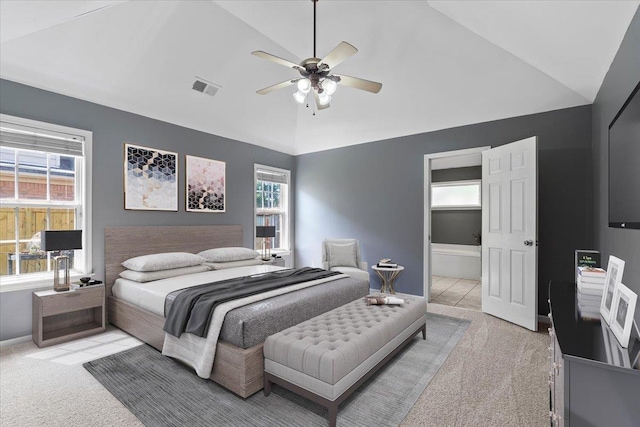 9270 Durhamshire Dr, Cordova, TN 38016 - bedroom with light carpet, vaulted ceiling, multiple windows, and baseboards