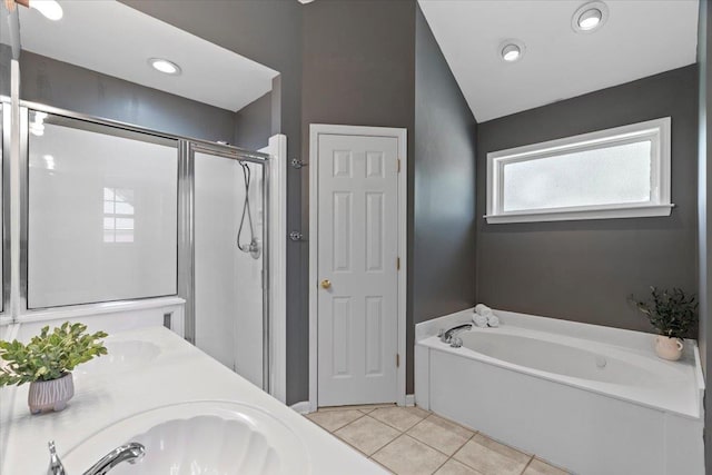 9270 Durhamshire Dr, Cordova, TN 38016 - full bathroom with tile patterned flooring, a garden tub, a stall shower, recessed lighting, and double vanity