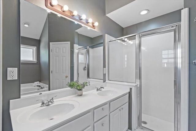 9270 Durhamshire Dr, Cordova, TN 38016 - bathroom featuring a stall shower, double vanity, and a bath