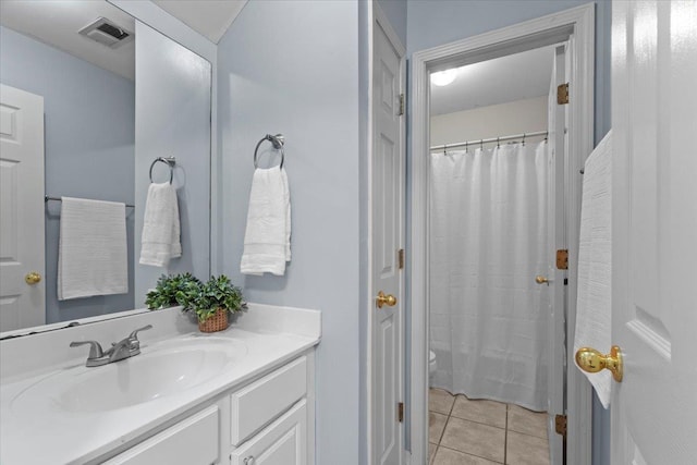9270 Durhamshire Dr, Cordova, TN 38016 - full bathroom featuring vanity, toilet, and tile patterned floors