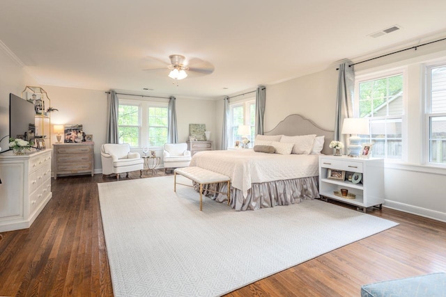 241 Greenway Rd, Memphis, TN 38117 - bedroom featuring crown molding, dark wood-type flooring, ceiling fan, and baseboards