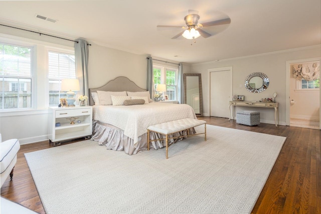 241 Greenway Rd, Memphis, TN 38117 - bedroom with wood finished floors, crown molding, baseboards, and a ceiling fan