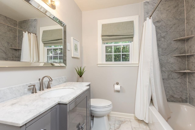 241 Greenway Rd, Memphis, TN 38117 - full bathroom featuring marble look tile flooring, vanity, toilet, baseboards, and shower / bath combo with shower curtain
