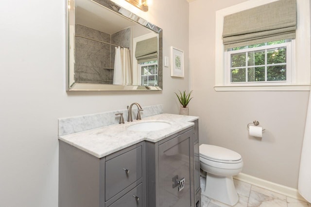 241 Greenway Rd, Memphis, TN 38117 - full bath with toilet, marble look tiles, vanity, baseboards, and a shower with shower curtain