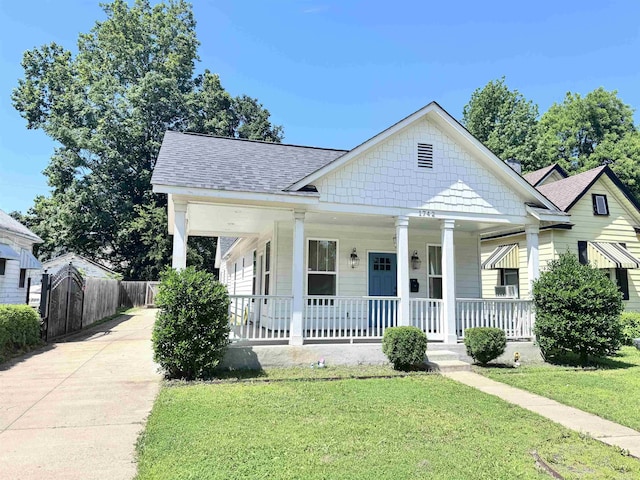 1742 Nelson Ave, Memphis, TN 38114 - view of front of property featuring a porch, driveway, and roof with shingles
