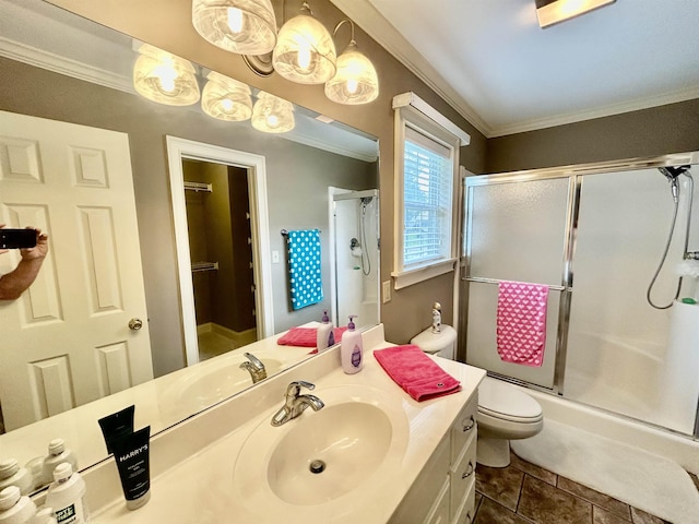 20 Betty Blvd, Iuka, MS 38852 - full bathroom featuring crown molding, a shower with door, toilet, and vanity