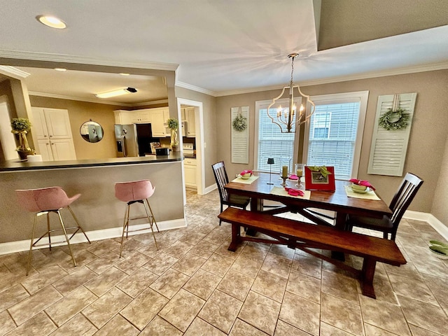20 Betty Blvd, Iuka, MS 38852 - dining space with a chandelier, ornamental molding, baseboards, and recessed lighting