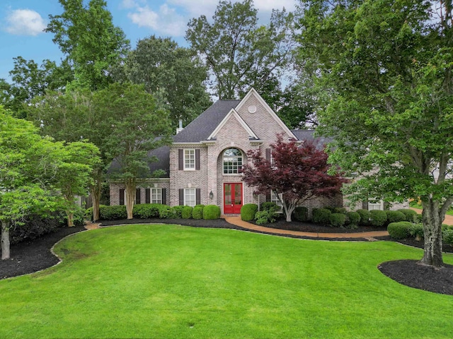 2073 W Houston Way, Collierville, TN 38139 - georgian-style home with brick siding, french doors, and a front yard