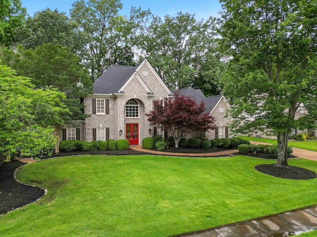 2073 W Houston Way, Collierville, TN 38139 - colonial home featuring brick siding, a front lawn, and french doors