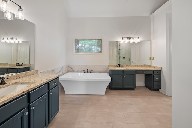 2073 W Houston Way, Collierville, TN 38139 - full bath with a stall shower, two vanities, tile patterned flooring, and a soaking tub