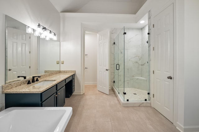 2073 W Houston Way, Collierville, TN 38139 - bathroom with a marble finish shower, vanity, baseboards, a freestanding bath, and recessed lighting