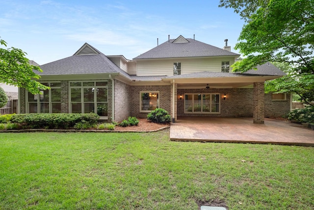 2073 W Houston Way, Collierville, TN 38139 - back of property featuring brick siding, a shingled roof, a yard, and a patio area