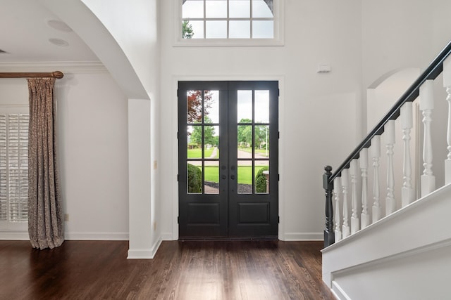 2073 W Houston Way, Collierville, TN 38139 - foyer with wood finished floors, stairway, french doors, baseboards, and arched walkways